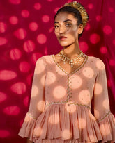 Pale peach pink chikankari mukaish lehenga and dupatta with embroidered peplum blouse - Sohni